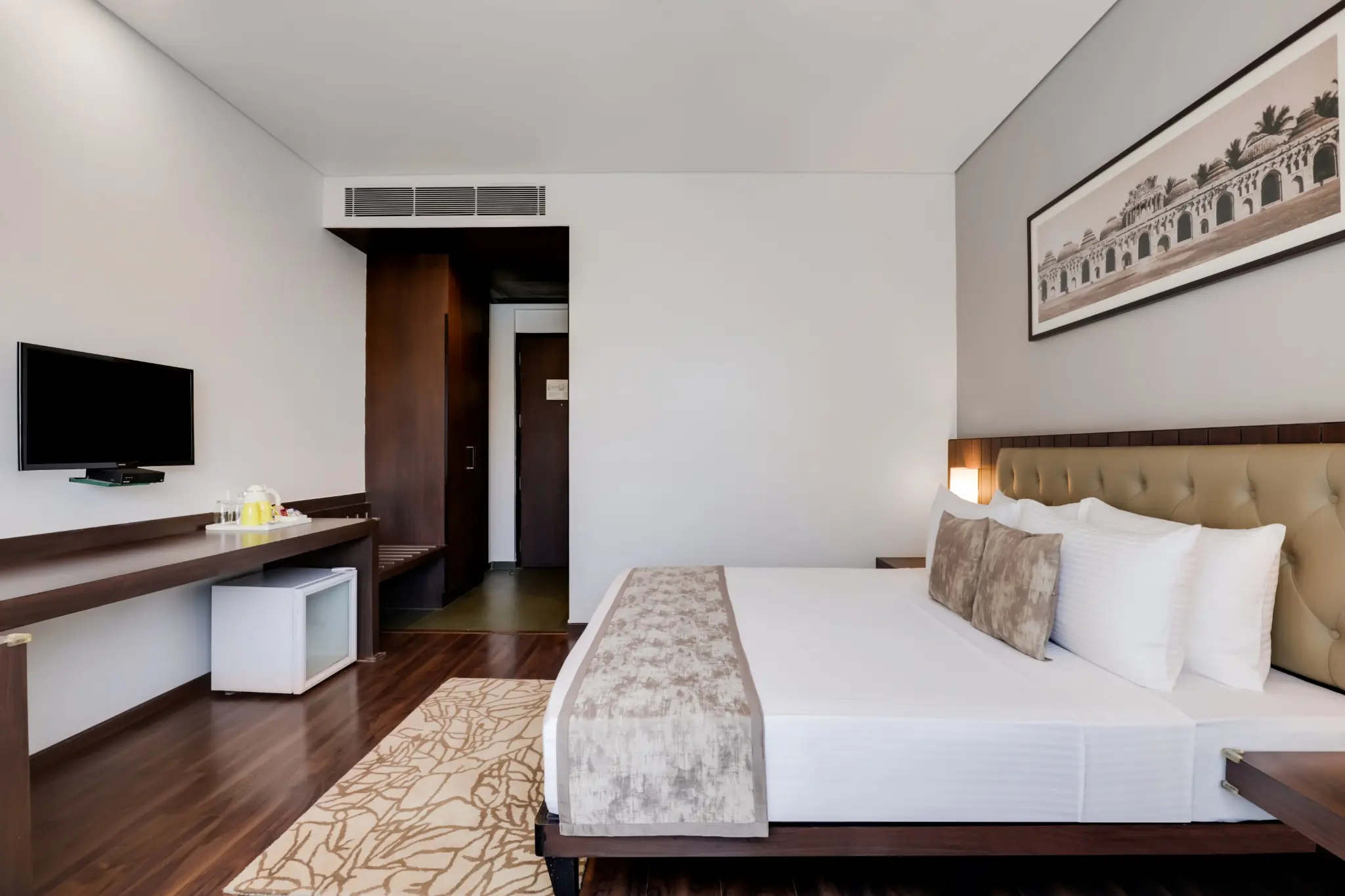Superior Queen Room bedroom and workspace